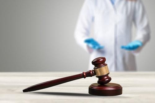 Gavel and stethoscope representing medical treatment duration after a NJ car accident