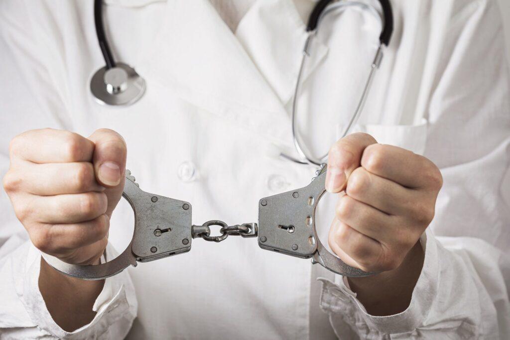 Doctor reviewing medical coverage under NJ PIP insurance benefits